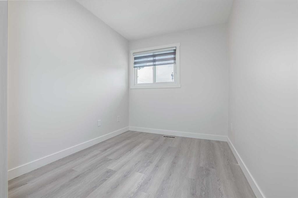152 Falconridge Crescent Ne, Calgary, AB - Indoor Photo Showing Other Room