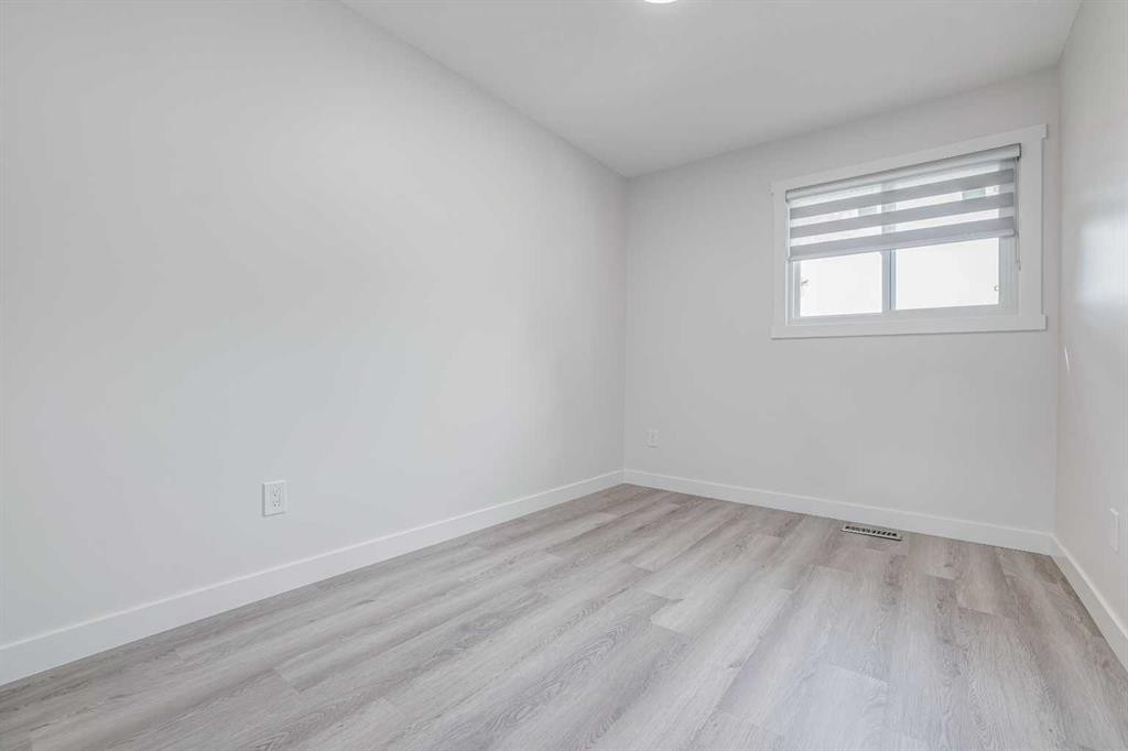152 Falconridge Crescent Ne, Calgary, AB - Indoor Photo Showing Other Room
