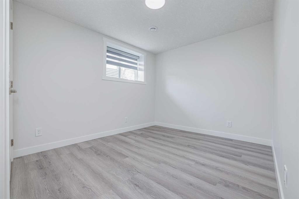 152 Falconridge Crescent Ne, Calgary, AB - Indoor Photo Showing Other Room