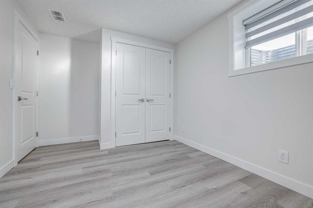 152 Falconridge Crescent Ne, Calgary, AB - Indoor Photo Showing Other Room
