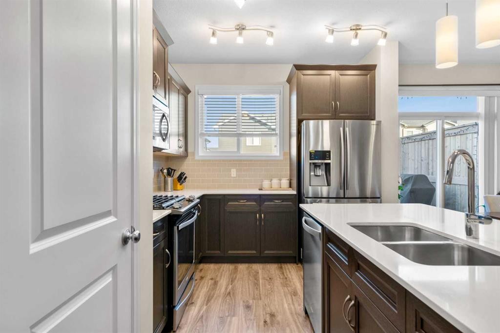 50 Legacy Glen Common Se, Calgary, AB - Indoor Photo Showing Kitchen With Double Sink With Upgraded Kitchen