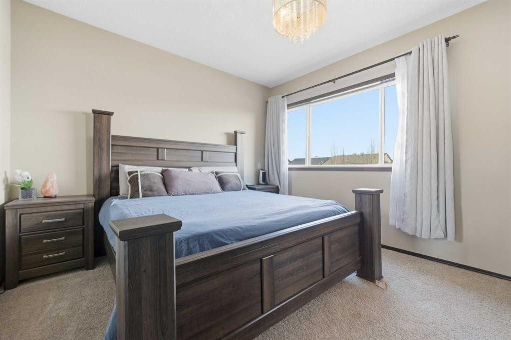 65 Elgin Meadows Circle Se, Calgary, AB - Indoor Photo Showing Bedroom