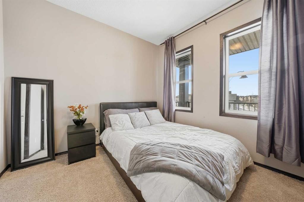 65 Elgin Meadows Circle Se, Calgary, AB - Indoor Photo Showing Bedroom
