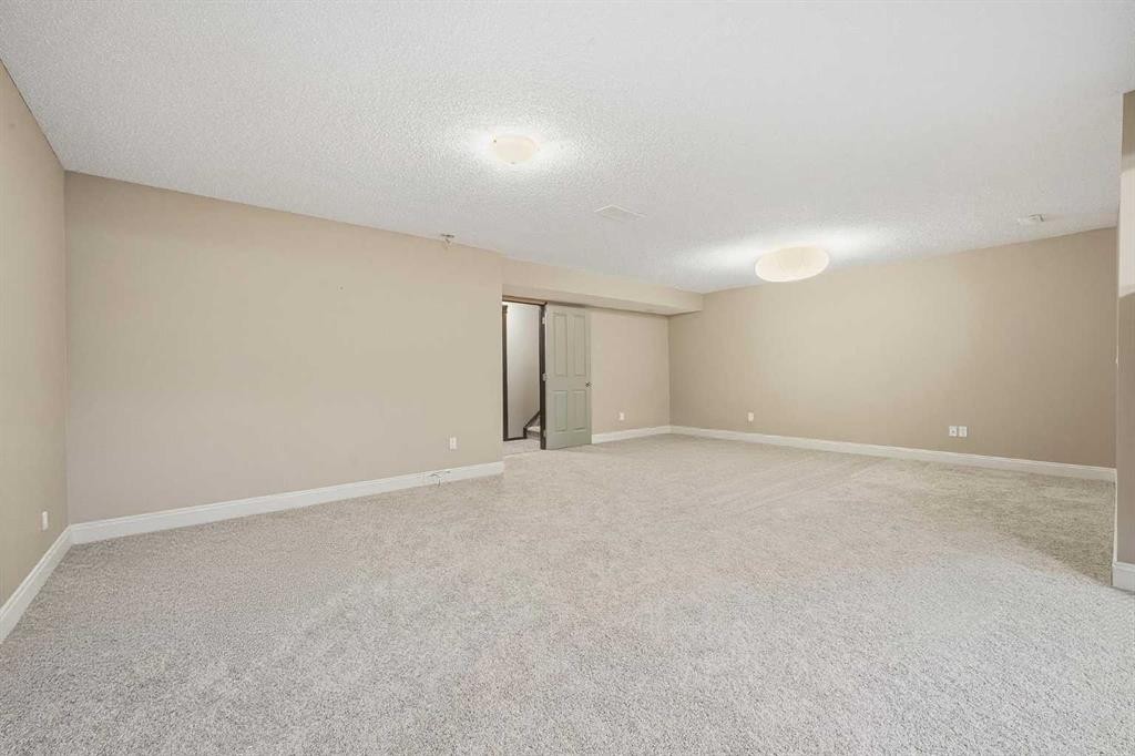 65 Elgin Meadows Circle Se, Calgary, AB - Indoor Photo Showing Other Room