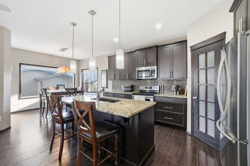 65 Elgin Meadows Circle Se, Calgary, AB - Indoor Photo Showing Kitchen With Stainless Steel Kitchen With Upgraded Kitchen
