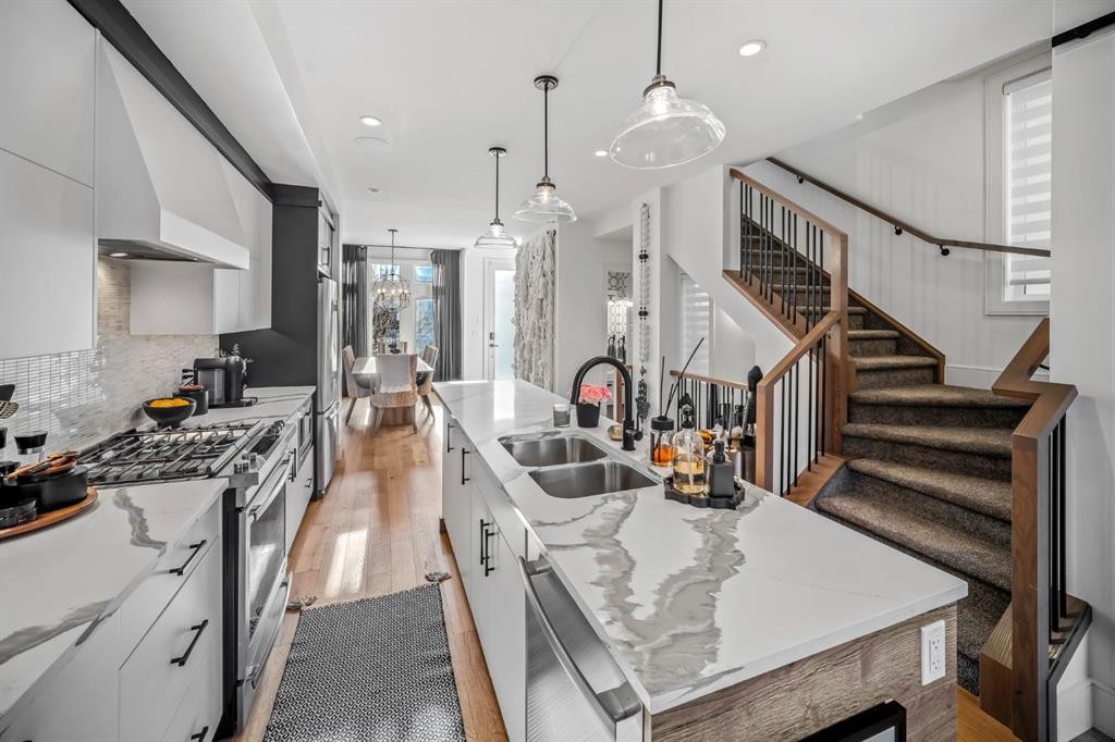 1910 48 Avenue Sw, Calgary, AB - Indoor Photo Showing Kitchen With Stainless Steel Kitchen With Double Sink With Upgraded Kitchen