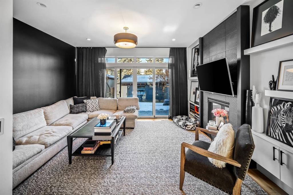 1910 48 Avenue Sw, Calgary, AB - Indoor Photo Showing Living Room With Fireplace