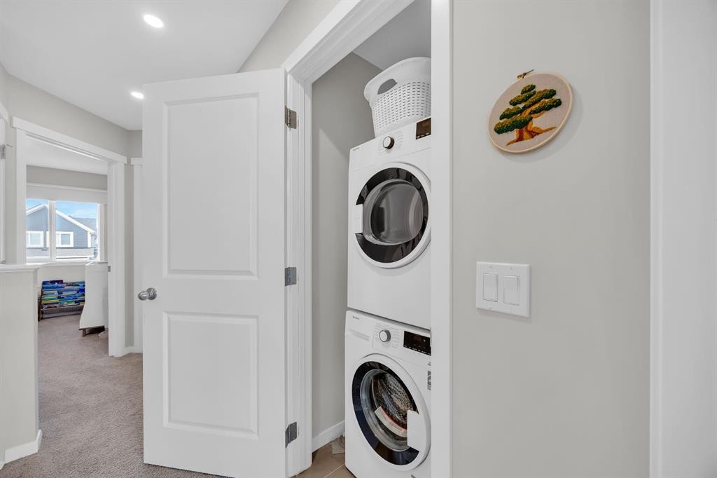 954 Mahogany Boulevard Se, Calgary, AB - Indoor Photo Showing Laundry Room