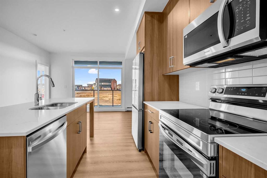 7209-1802 Mahogany Boulevard, Calgary, AB - Indoor Photo Showing Kitchen