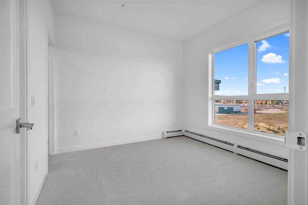 7209-1802 Mahogany Boulevard, Calgary, AB - Indoor Photo Showing Other Room