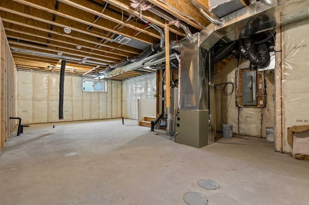 90 Heritage Circle, Cochrane, AB - Indoor Photo Showing Basement