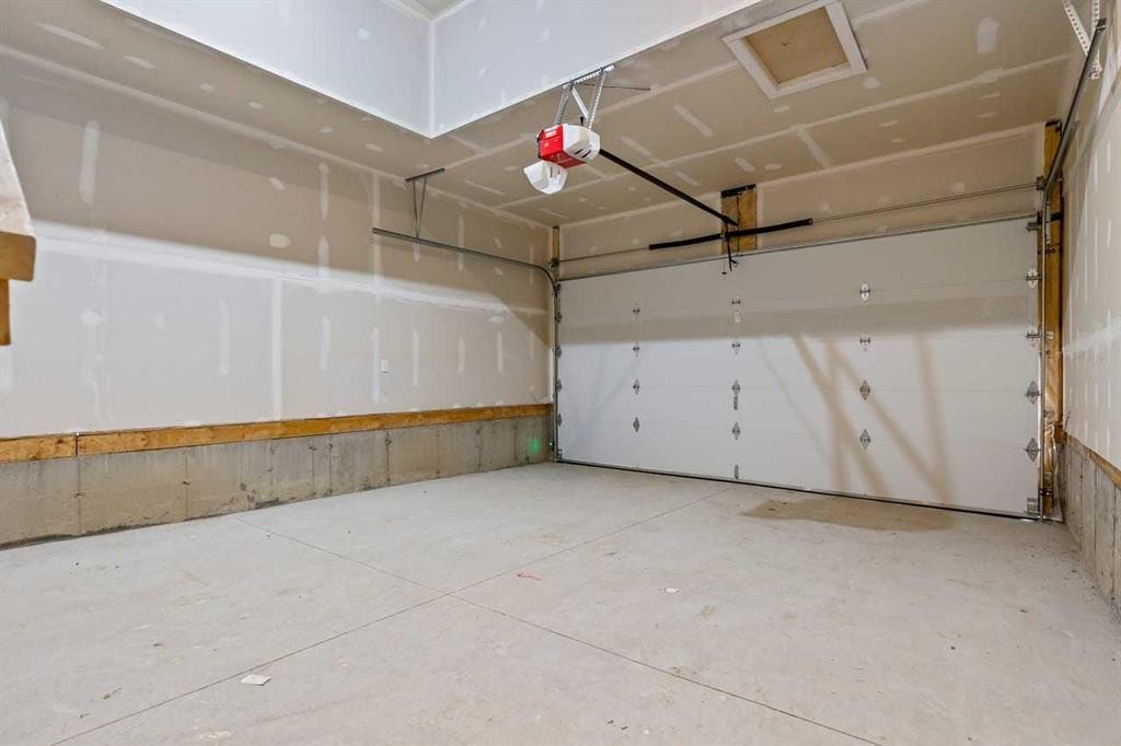 90 Heritage Circle, Cochrane, AB - Indoor Photo Showing Garage