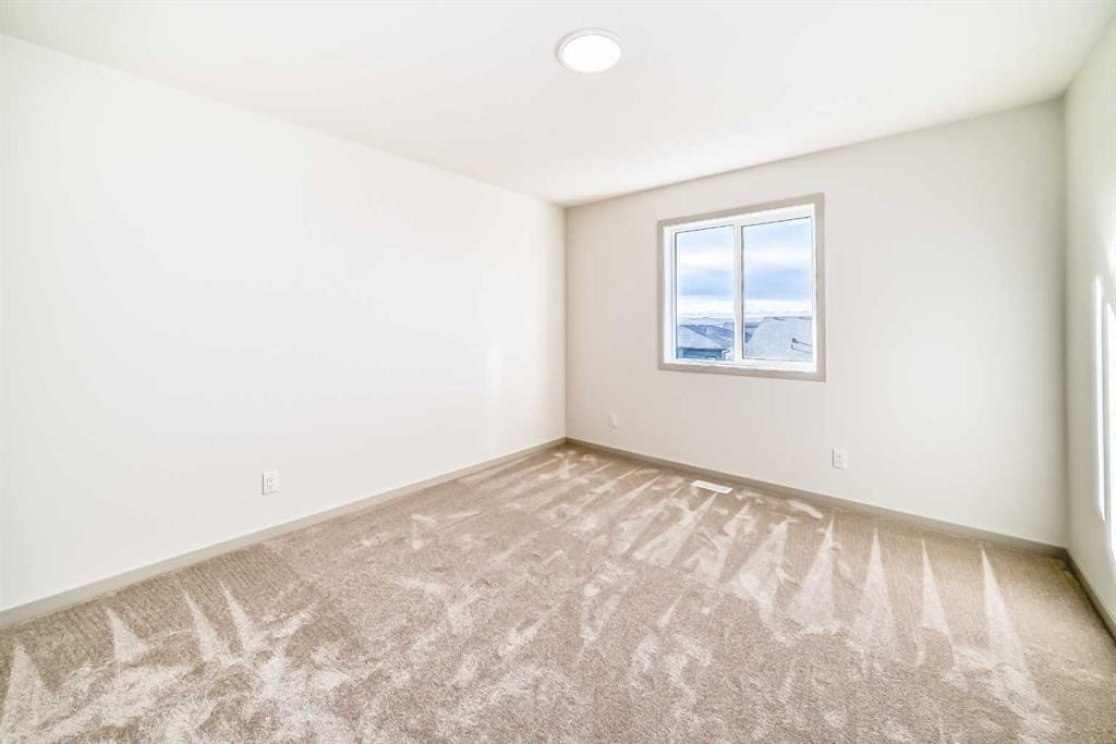 31 Lucas Passage Nw, Calgary, AB - Indoor Photo Showing Other Room
