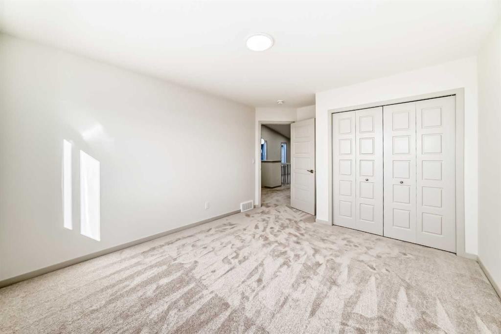 31 Lucas Passage Nw, Calgary, AB - Indoor Photo Showing Other Room