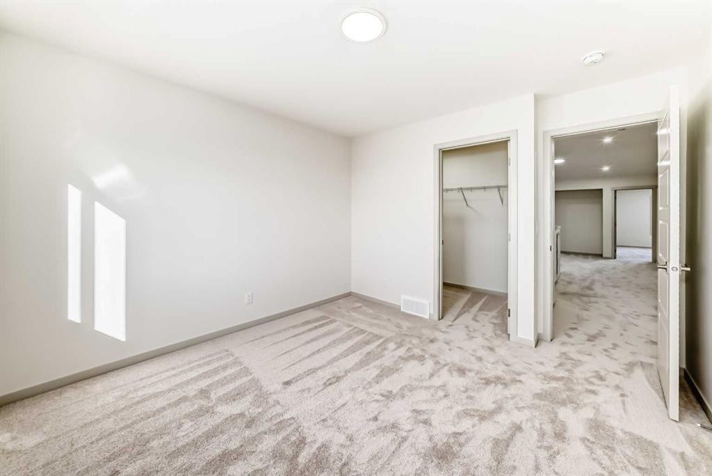 31 Lucas Passage Nw, Calgary, AB - Indoor Photo Showing Other Room