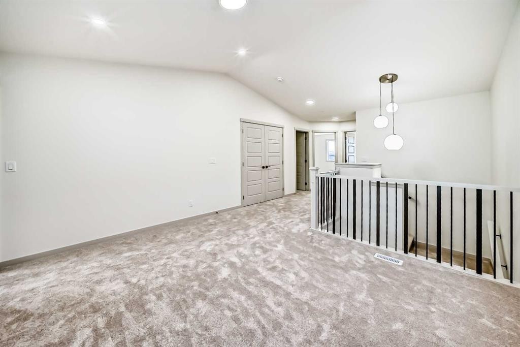31 Lucas Passage Nw, Calgary, AB - Indoor Photo Showing Other Room