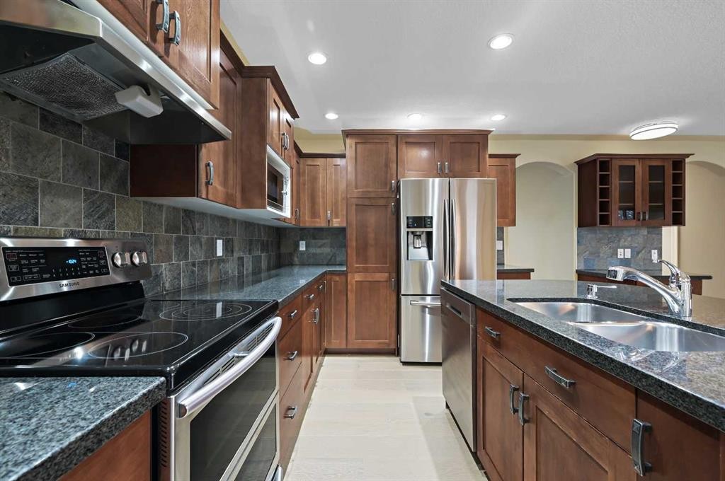 5619 Coach Hill Road Sw, Calgary, AB - Indoor Photo Showing Kitchen With Stainless Steel Kitchen With Double Sink