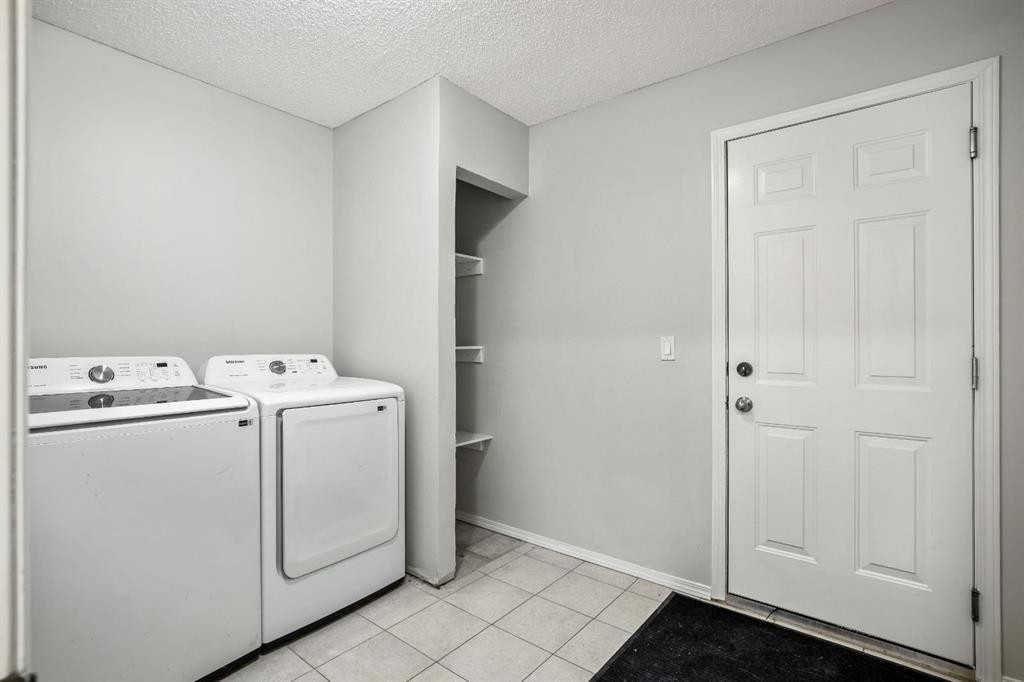 104 Cove Crescent, Chestermere, AB - Indoor Photo Showing Laundry Room