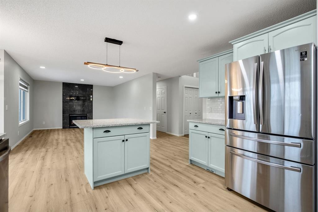 104 Cove Crescent, Chestermere, AB - Indoor Photo Showing Kitchen With Stainless Steel Kitchen