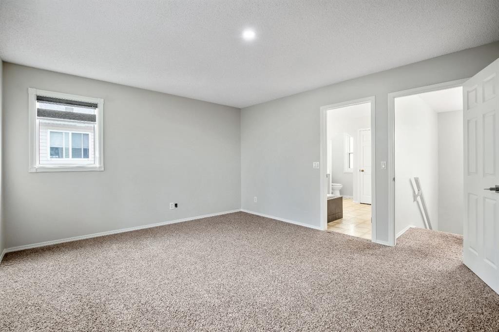 104 Cove Crescent, Chestermere, AB - Indoor Photo Showing Other Room