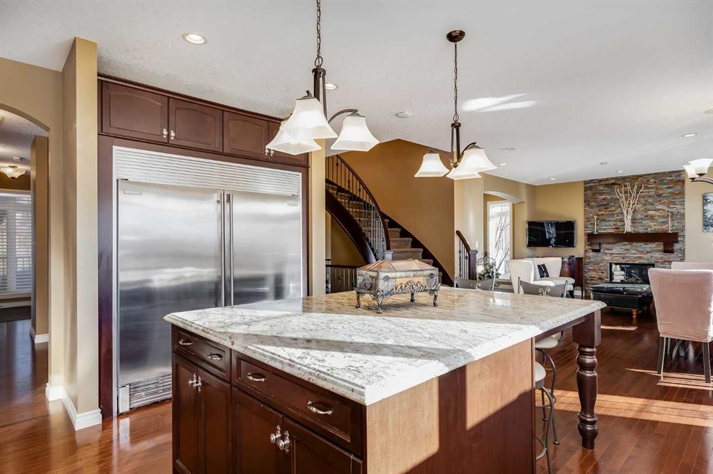 213 Silverado Ranch Manor Sw, Calgary, AB - Indoor Photo Showing Kitchen With Fireplace With Upgraded Kitchen