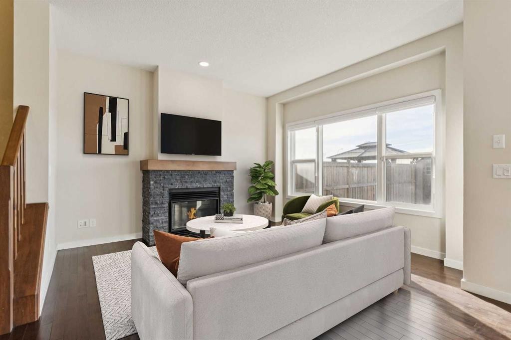 116 Walden Parade Se, Calgary, AB - Indoor Photo Showing Living Room With Fireplace