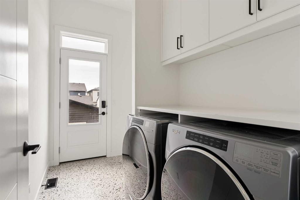 103 Haskayne Drive Nw, Calgary, AB - Indoor Photo Showing Laundry Room