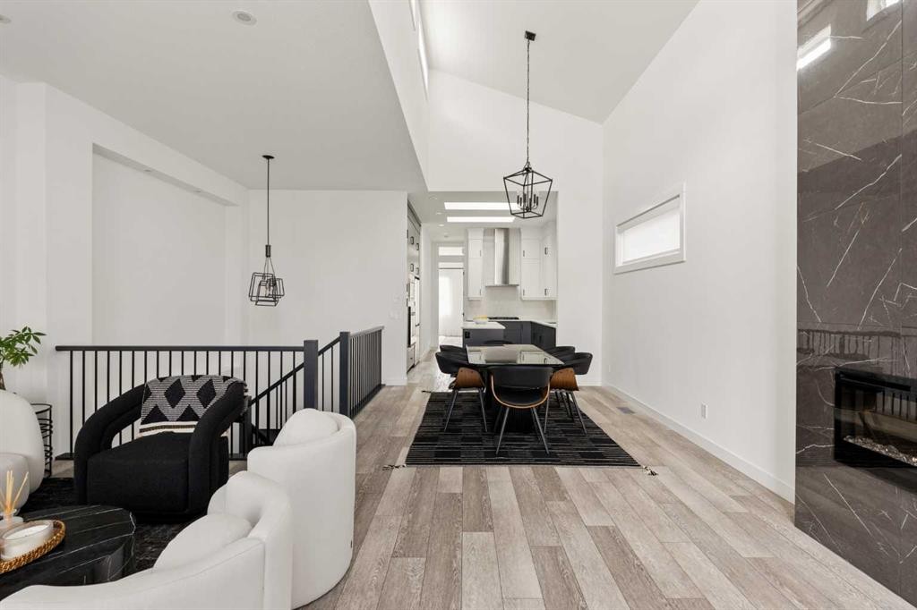103 Haskayne Drive Nw, Calgary, AB - Indoor With Fireplace