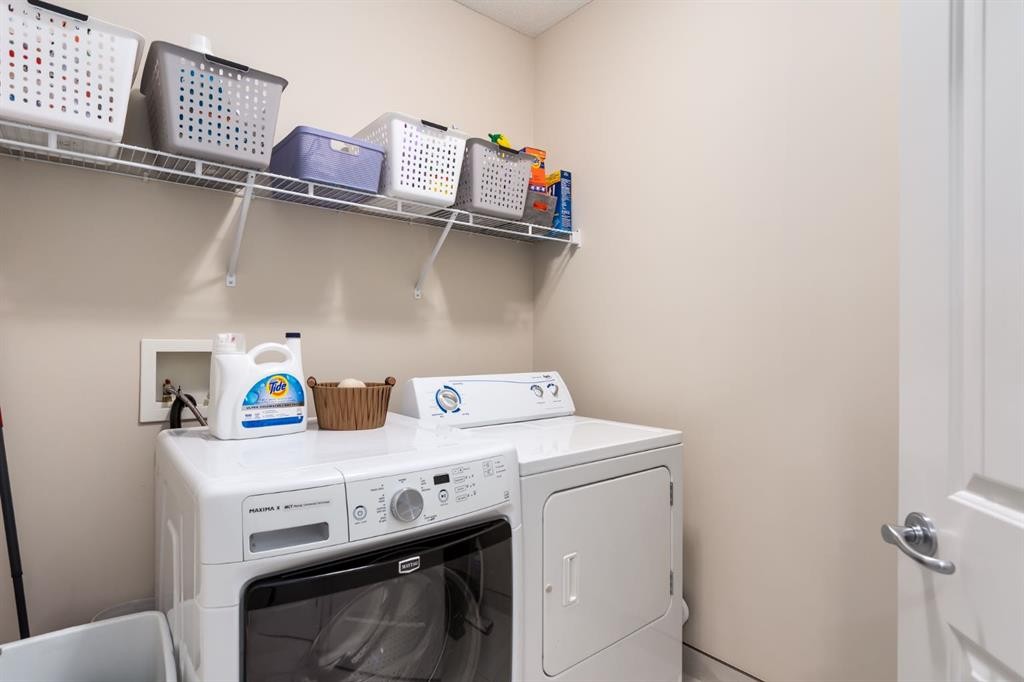 128 Seagreen Manor, Chestermere, AB - Indoor Photo Showing Laundry Room