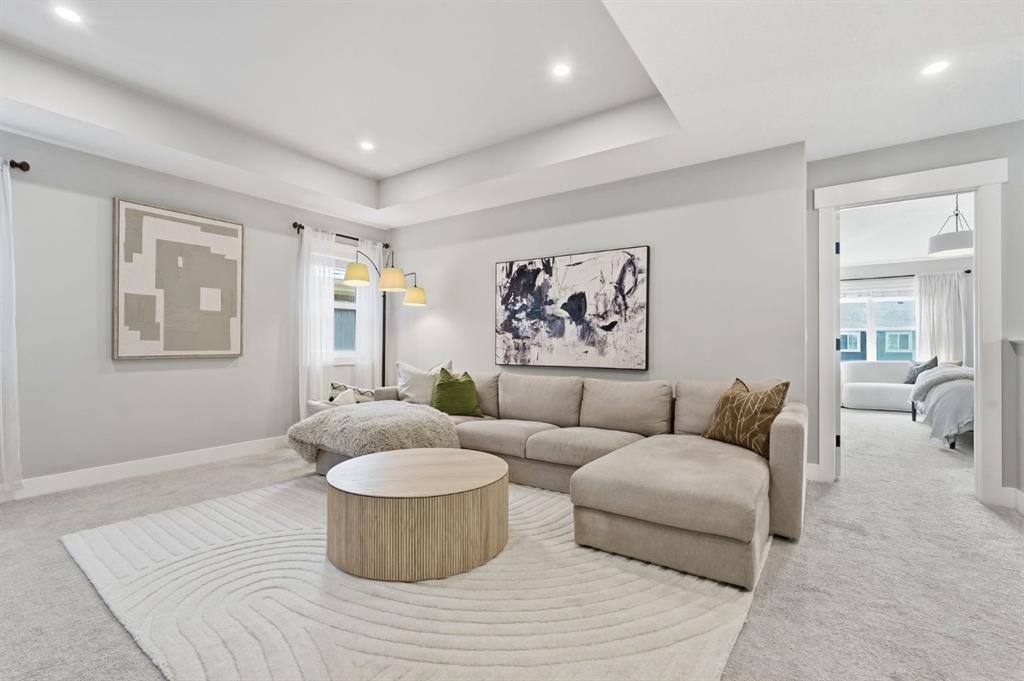 19 Masters Green Se, Calgary, AB - Indoor Photo Showing Living Room