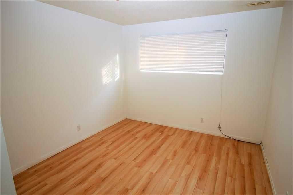 649 Pineland Road Ne, Calgary, AB - Indoor Photo Showing Other Room