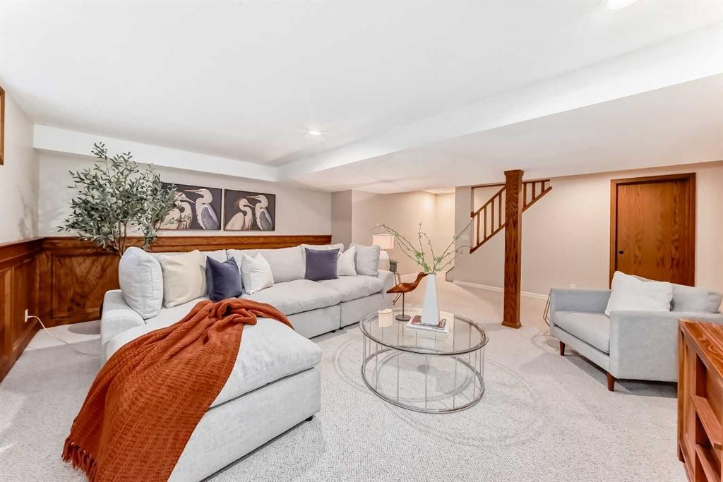 36 Stradbrooke Way Sw, Calgary, AB - Indoor Photo Showing Living Room