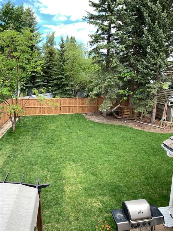 36 Stradbrooke Way Sw, Calgary, AB - Outdoor With Backyard