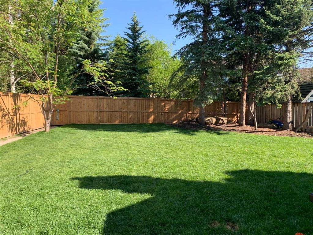 36 Stradbrooke Way Sw, Calgary, AB - Outdoor With Backyard