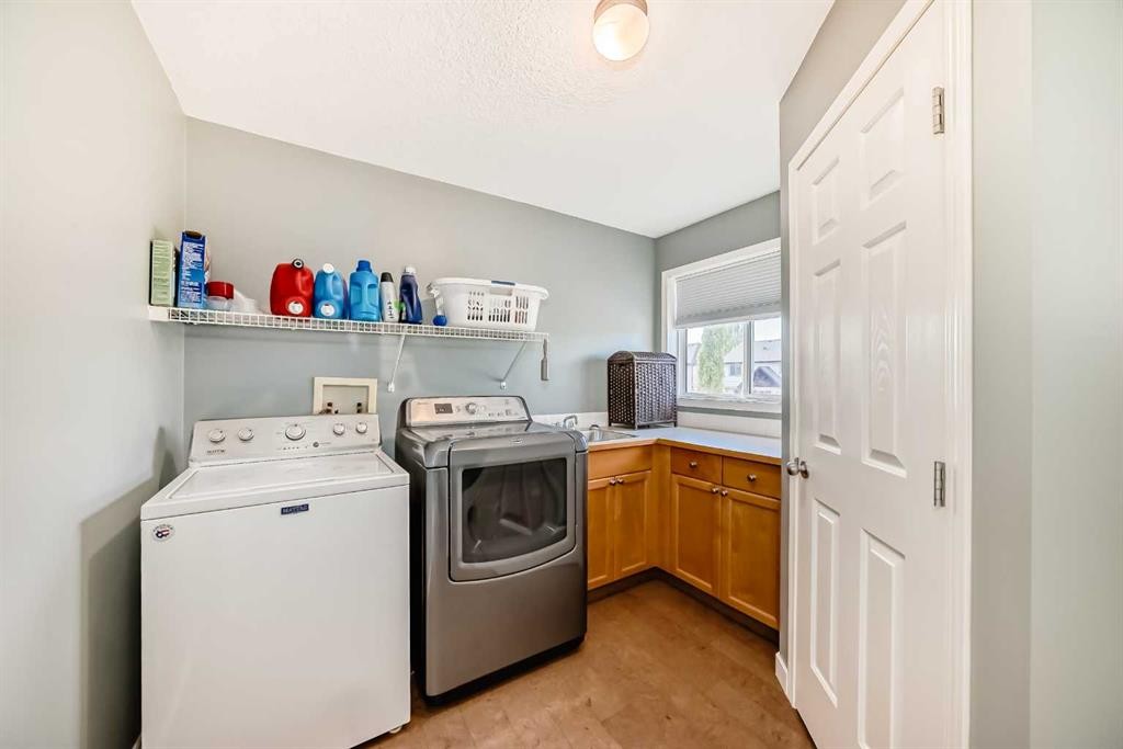 26 Copperfield View Se, Calgary, AB - Indoor Photo Showing Laundry Room