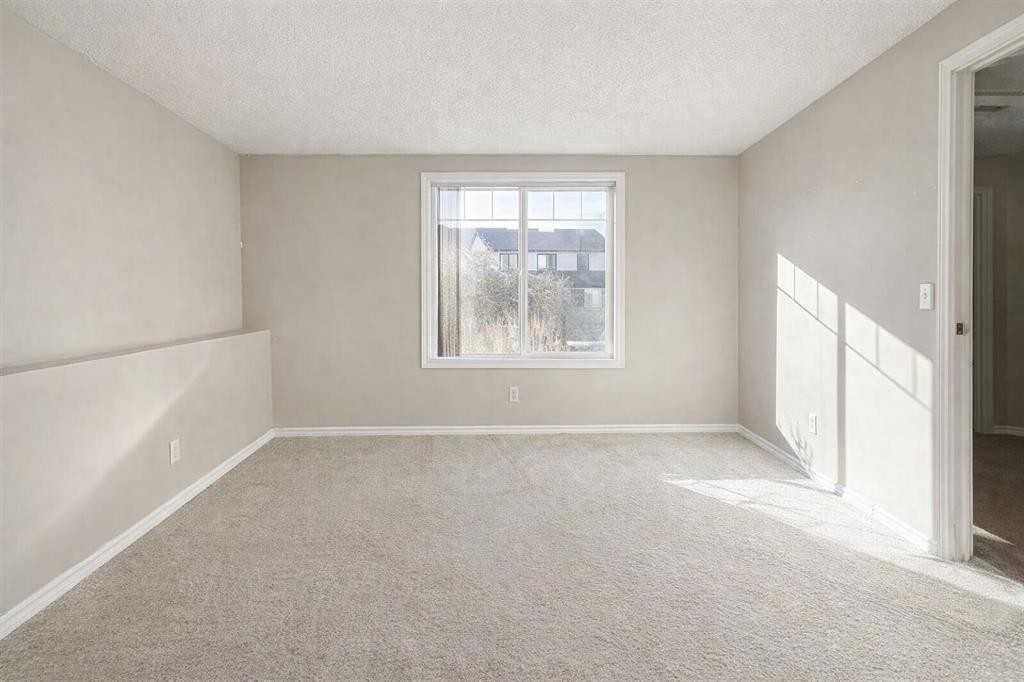 26 Copperfield View Se, Calgary, AB - Indoor Photo Showing Other Room
