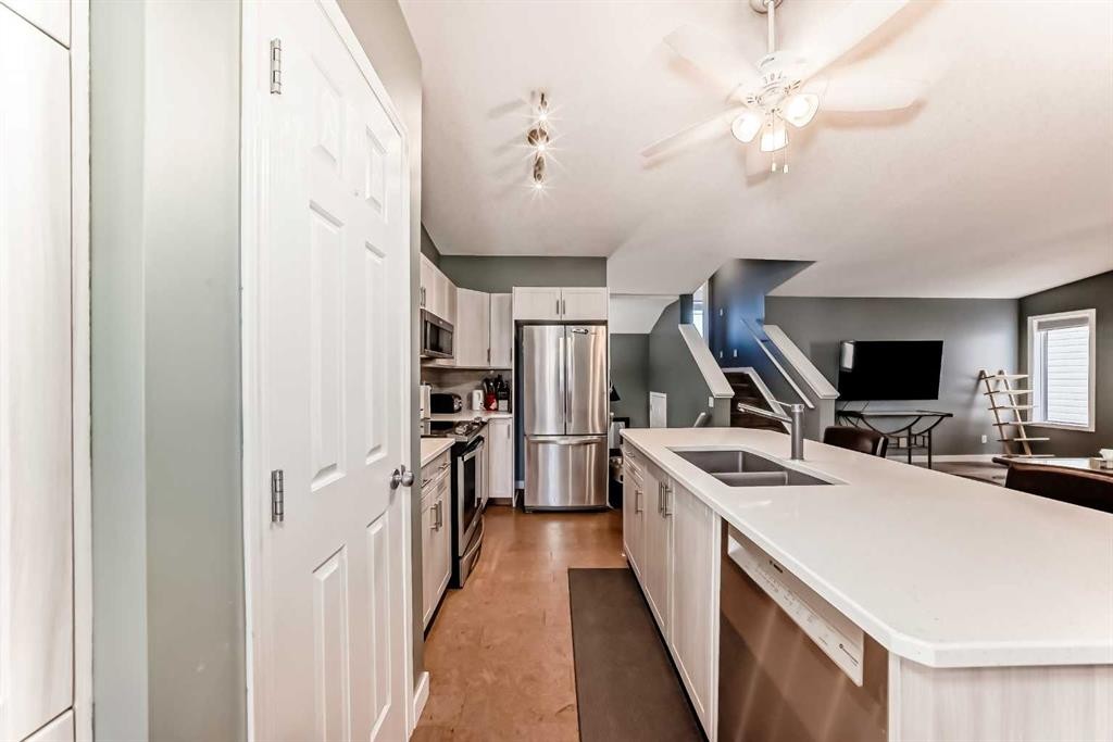 26 Copperfield View Se, Calgary, AB - Indoor Photo Showing Kitchen With Double Sink With Upgraded Kitchen