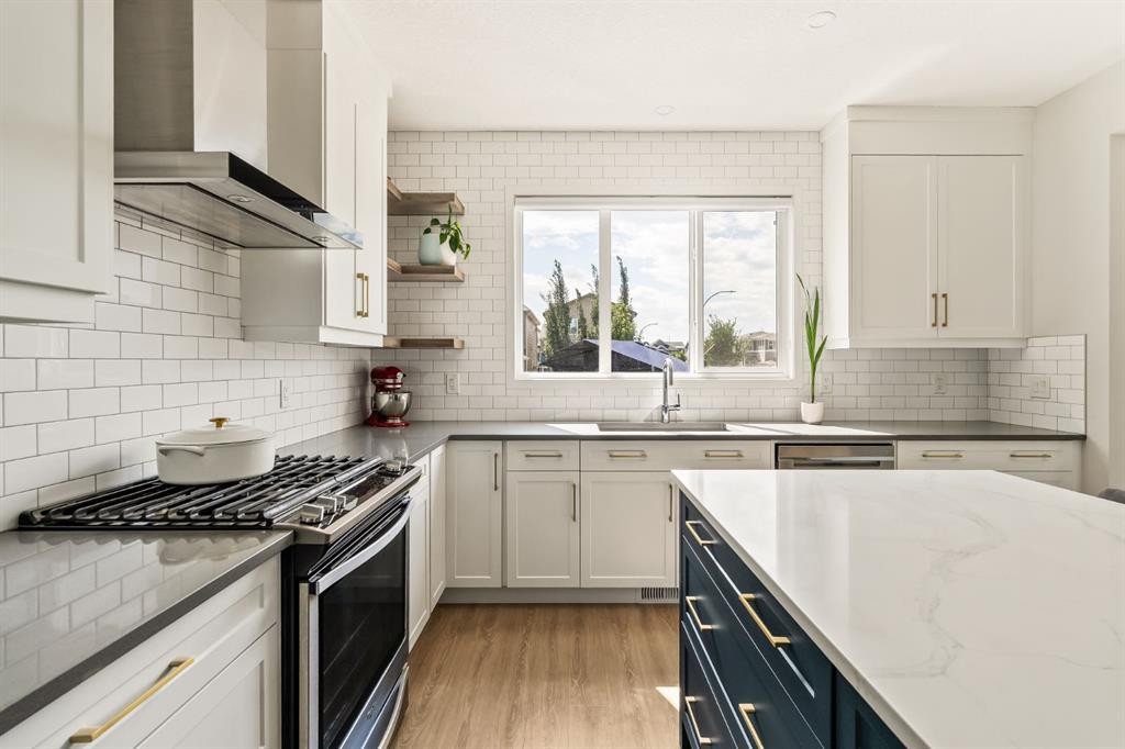 63 Seton Gardens Se, Calgary, AB - Indoor Photo Showing Kitchen With Upgraded Kitchen