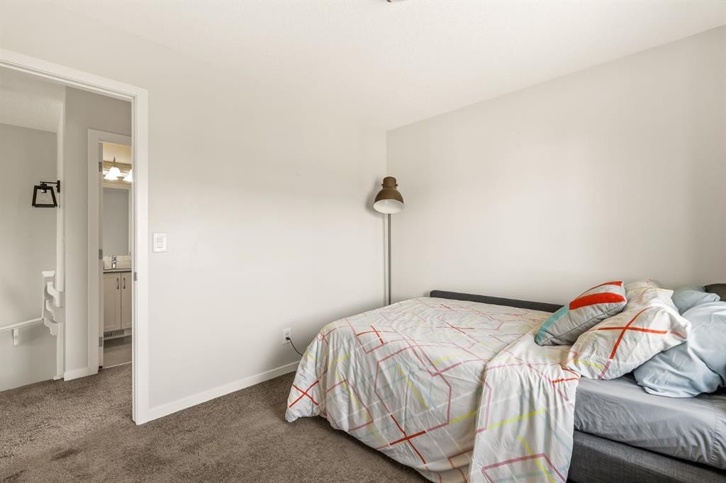 63 Seton Gardens Se, Calgary, AB - Indoor Photo Showing Bedroom