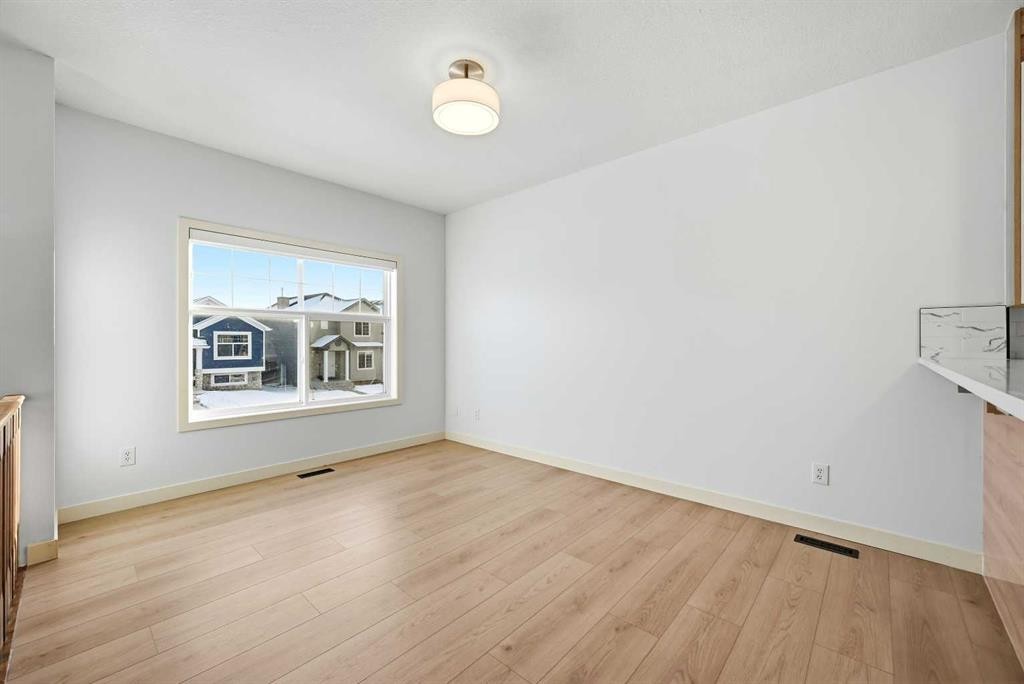 81 Saddlemont Road Ne, Calgary, AB - Indoor With Fireplace