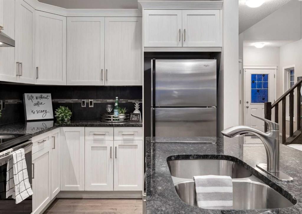 63 Panton Way Nw, Calgary, AB - Indoor Photo Showing Kitchen With Double Sink With Upgraded Kitchen