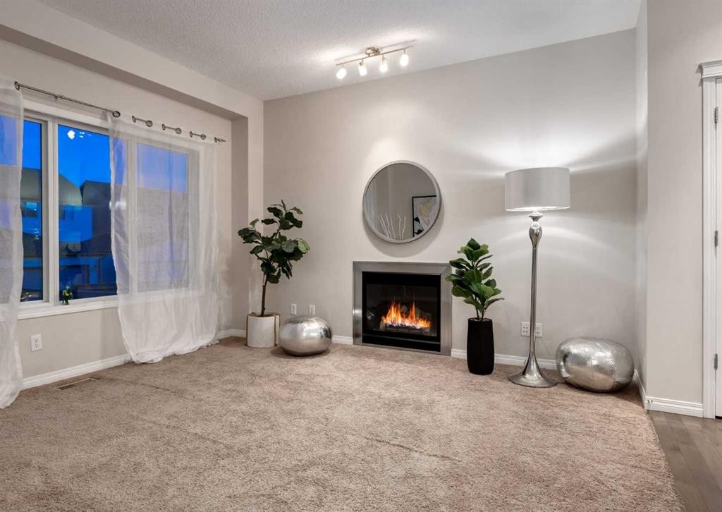 63 Panton Way Nw, Calgary, AB - Indoor With Fireplace