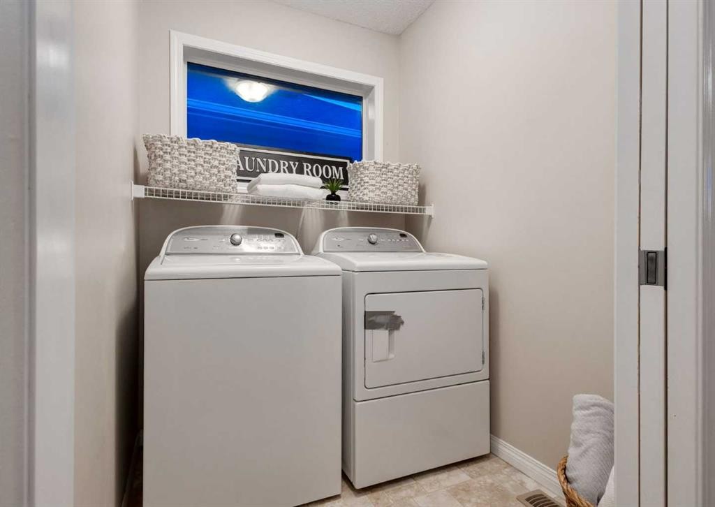63 Panton Way Nw, Calgary, AB - Indoor Photo Showing Laundry Room