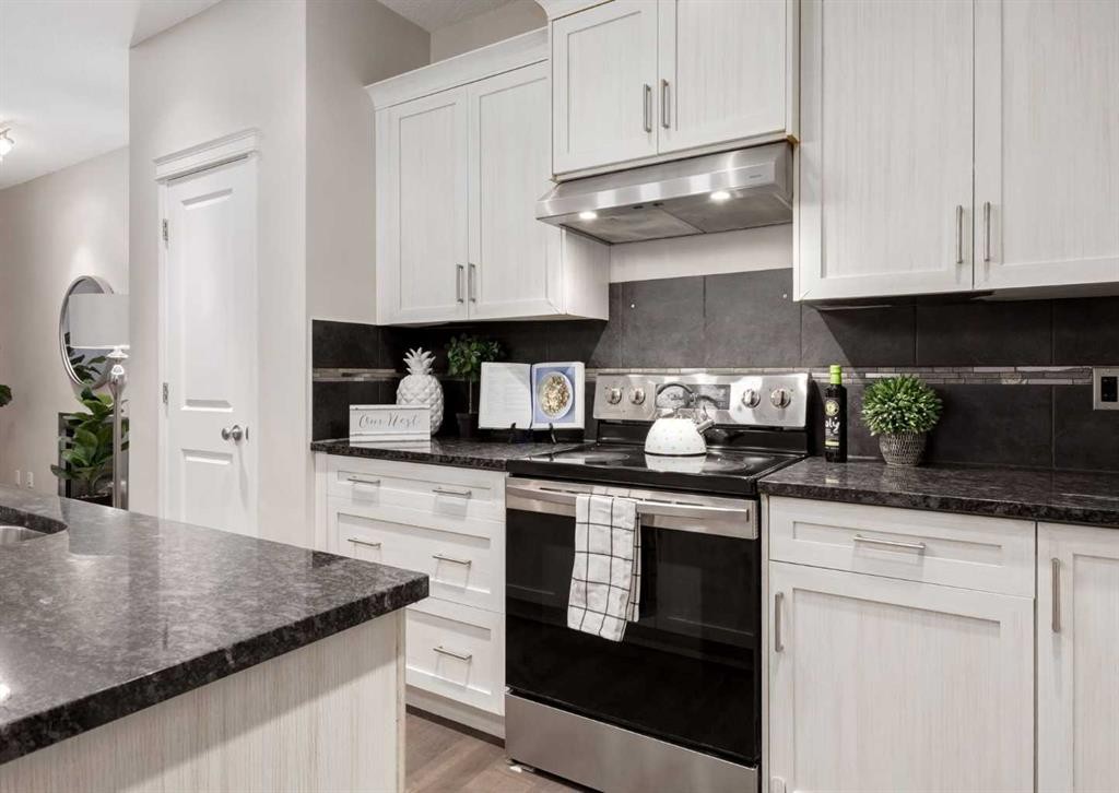 63 Panton Way Nw, Calgary, AB - Indoor Photo Showing Kitchen With Upgraded Kitchen