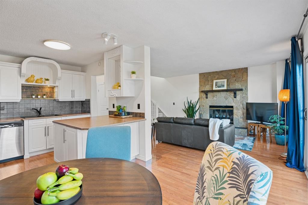 164 Beddington Circle Ne, Calgary, AB - Indoor Photo Showing Other Room With Fireplace