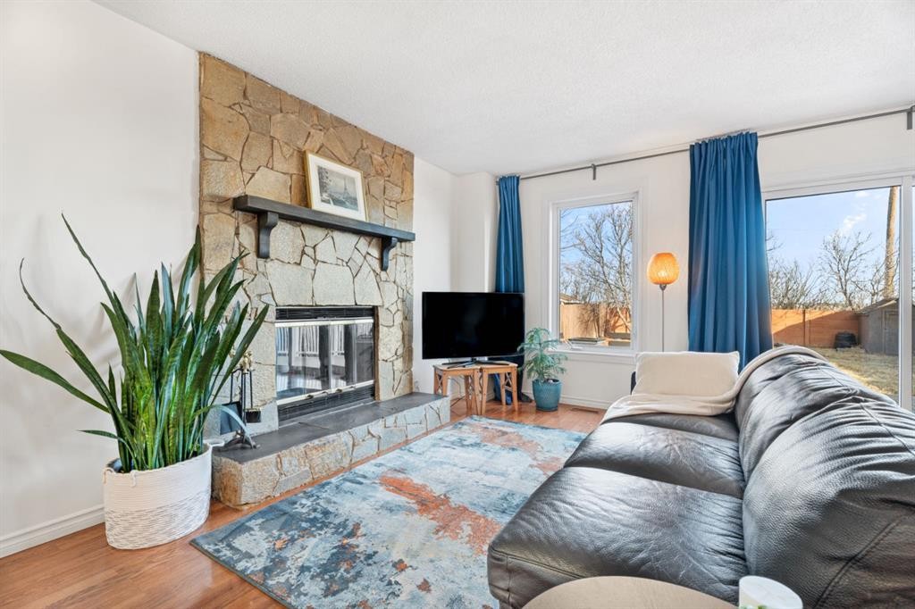 164 Beddington Circle Ne, Calgary, AB - Indoor Photo Showing Living Room With Fireplace