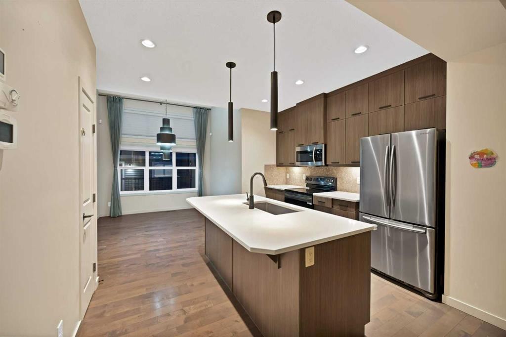 41 Red Embers Row Ne, Calgary, AB - Indoor Photo Showing Kitchen With Stainless Steel Kitchen With Upgraded Kitchen