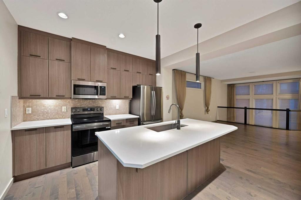 41 Red Embers Row Ne, Calgary, AB - Indoor Photo Showing Kitchen With Stainless Steel Kitchen With Double Sink