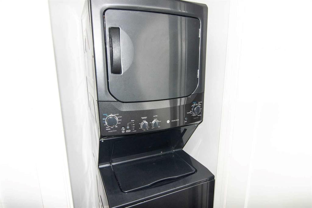 62 Walden Lane Se, Calgary, AB - Indoor Photo Showing Laundry Room