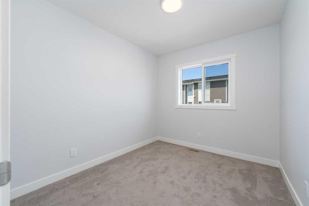 62 Walden Lane Se, Calgary, AB - Indoor Photo Showing Other Room